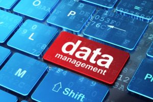 Information concept: Data Management on computer keyboard backgr