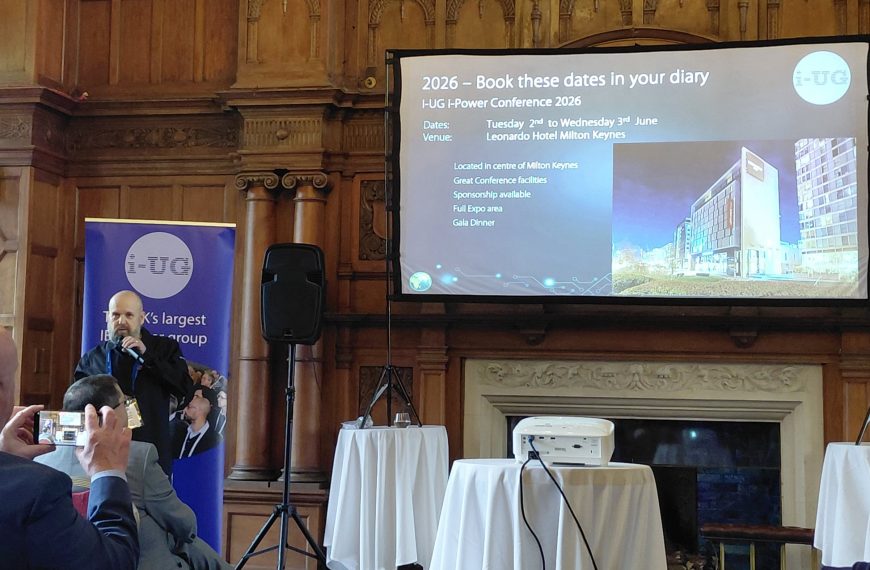 A person playing a guitar in front of a large screen AI-generated content may be incorrect.